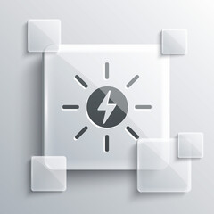 Grey Solar energy panel icon isolated on grey background. Sun with lightning symbol. Square glass panels. Vector.