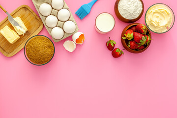 .Making strawberry pie for valentine's day. Products for the pie are flour, sugar, butter and strawberries.