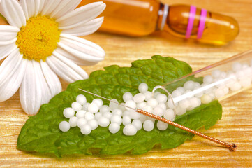 alternative medicine with acupuncture and herbal pills