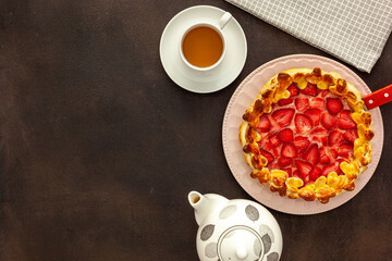 Fresh strawberry pie for breakfast with green tea
