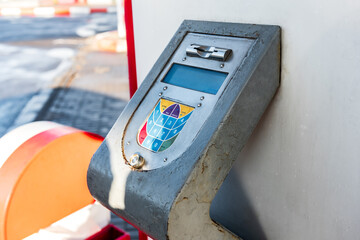 Old ATM machine at fuel station.