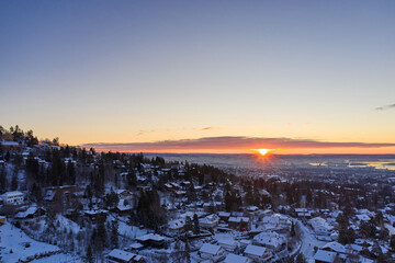 Aerial drone photography over Oslo, Norway, in January. Shot in a cold morning during sunrise. 