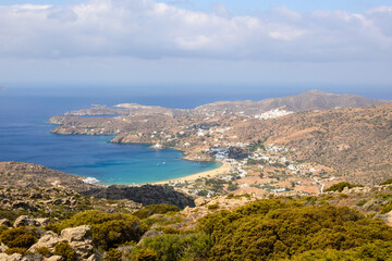 Fototapeta na wymiar West coast of Ios and Mylopotas Bay with its popular beach. Cyclades, Greece