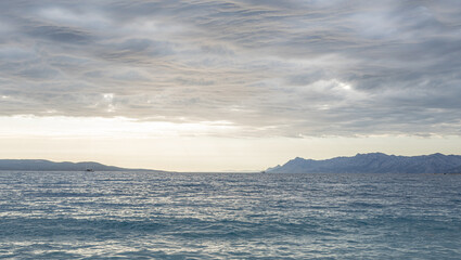 Panorama of beautiful sunset on the sea.