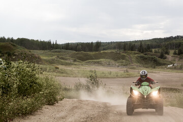 ATV youth driving forward © Piotr