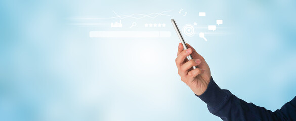 close up man hand holding smartphone to use search engine optimization (SEO) tools for find...