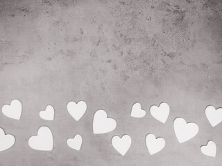 wooden hearts on grey background