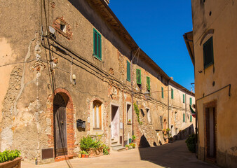 A street of historic stone buildings in the village of Montorsaio in Tuscany, part of Campagnatico in Grosseto province
