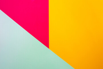 Minimalistic pink, yellow and light blue background. Copy space