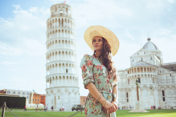 pensive traveller woman in floral dress having excursion