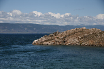 Fototapeta na wymiar Lake Baikal with blue water and rocky shore