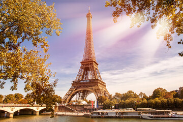 Fototapeta na wymiar Eiffel Tower in the rays of the autumn sun. Paris in France