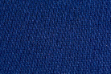 Blue fabric. Background and texture of fabric on the book.