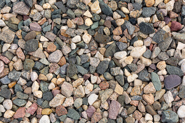 Granite gravel. Background and texture of stones for project and design.