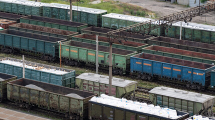 Freight Station with many trains and wagons - Cargo transportation