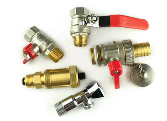 Plumbing details close-up on white isolated background. Bronze ball valve for water. Automatic...
