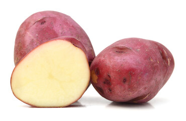 Close up of two red potatoes against white background. 