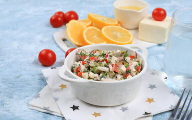 Vegetable salad with mozzarella cheese, cherry tomatoes and fresh arugula, Healthy natural breakfast with lemon, detox diet.Traditional Italian food,, cholesterol and GMO free, selective focus,