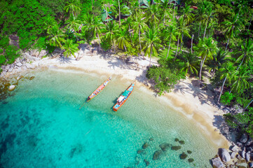 Aerial view of tropical beach and two longtail boats, Sai Nuan, koh Tao, Thailand