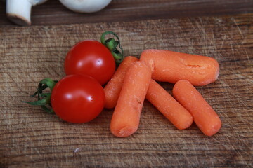 fresh spring vegetables close-up on a wooden table. 