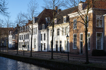 Canal with old historic buildings at the street Havik in the center of Amersfoort, Holland