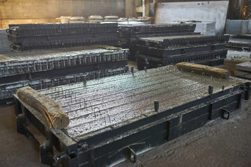 Manufacturing concrete slabs. reinforced concrete production. Workers working with metal, welding...