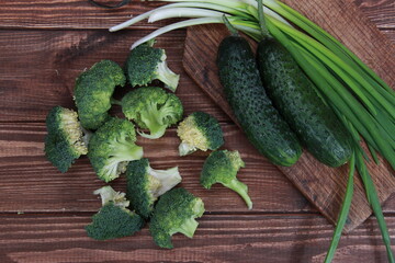 fresh spring vegetables close-up on a wooden table. 