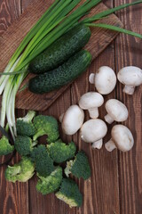 fresh spring vegetables close-up on a wooden table. 
