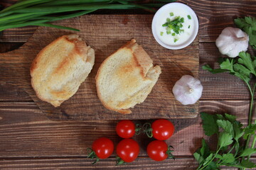 
fried croutons close-up on a wooden table