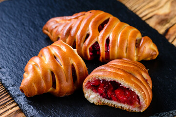 Traditional Russian baked pies pirozhki patties. russian homemade pies with berries