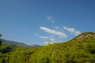 Fototapeta na wymiar green mountains in Turkey against the blue sky.