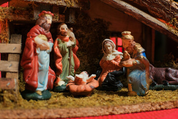Fototapeta na wymiar Holy night and Jesus Christ Nativity scene. Religious scene of christmas figurines
