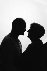 Elderly couple hugging in black and white colors. Happy loving caring people. Caucasian retired man and woman. valentines day