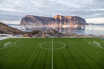 Uummannaq Football Field, North Greenland. One the most beautiful places to play soccer in the...