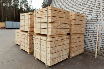 Packaged boards, lumber piles, ready for shipment at the finished product warehouse