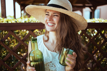 smiling modern 40 years old woman in white shirt