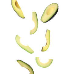 Falling fresh ripe avocados on white background