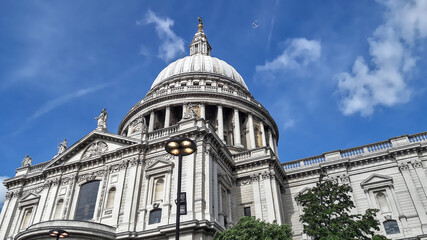 bubbles flying in over cloudy sky in front St. Paul's Cathedral