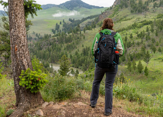 Female Backpacker Looks out Over Yellowstone