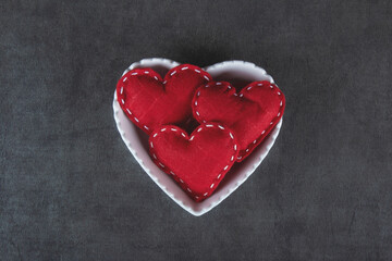 Fototapeta premium Valentine’s day background with red heart and gray background.