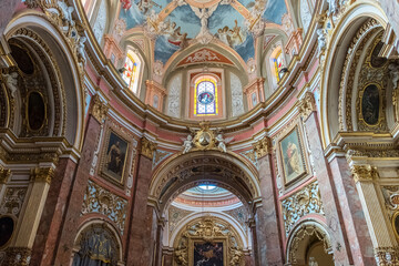 Obraz premium Beautiful interior with paintings and decorations inside of Church in Valletta (or Il-Belt), the capital of the Mediterranean island nation of Malta