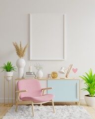 Poster mockup with vertical frames on empty white wall in living room interior with pink velvet armchair.
