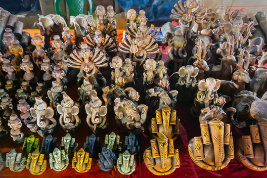 Colorful Lord Ganesha and Goddess Durga , Terracotta dolls displayed, made in Krishnanagar, Nadia, West Bengal, for sale in Handicraft Fair in Kolkata. Biggest handicraft fair in Asia.