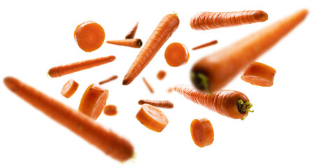 Ripe carrots whole and sliced levitate on a white background