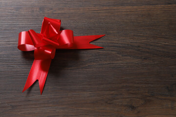 red gift boxes on wooden background with space