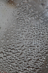 Water drops in transparent bottle close up modern background high quality prints