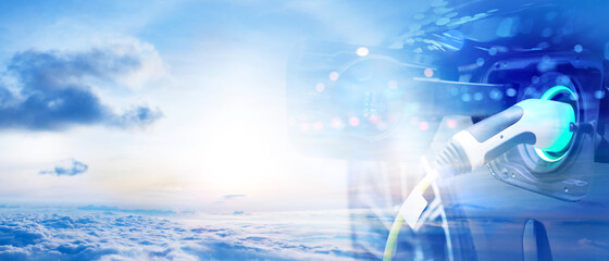 Vehicle electric car charge battery clean energy eco concept, with blue sky and cloud blur bokeh on...