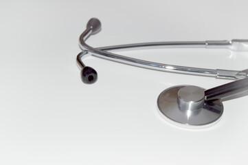stethoscope on white background close-up, health and medicine concept