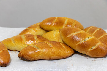 Traditional Russian pastry. Russian pirozhki, homemade baked patties.