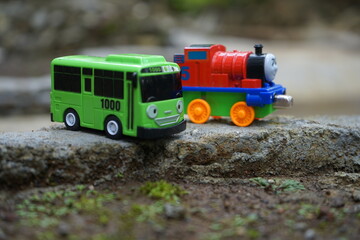 Tayo's Little Bus Toy on the Edge of a Rocky Road